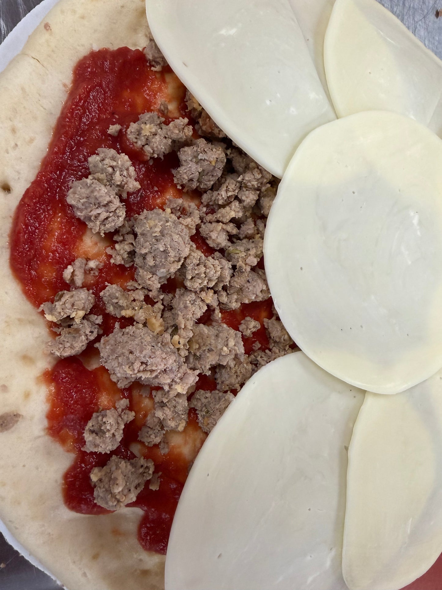 Drago’s Pizza (spicy sausage)